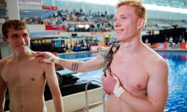 Carson Tyler and Andrew Capobianco after competing in the men's 3m springboard final during the U.S. Olympic Diving Trials  in Knoxville