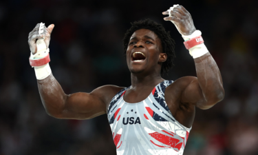 Frederick Richard of the United States celebrates after his high bar routine during the men's team final at the 2024 Paris Olympic Games.