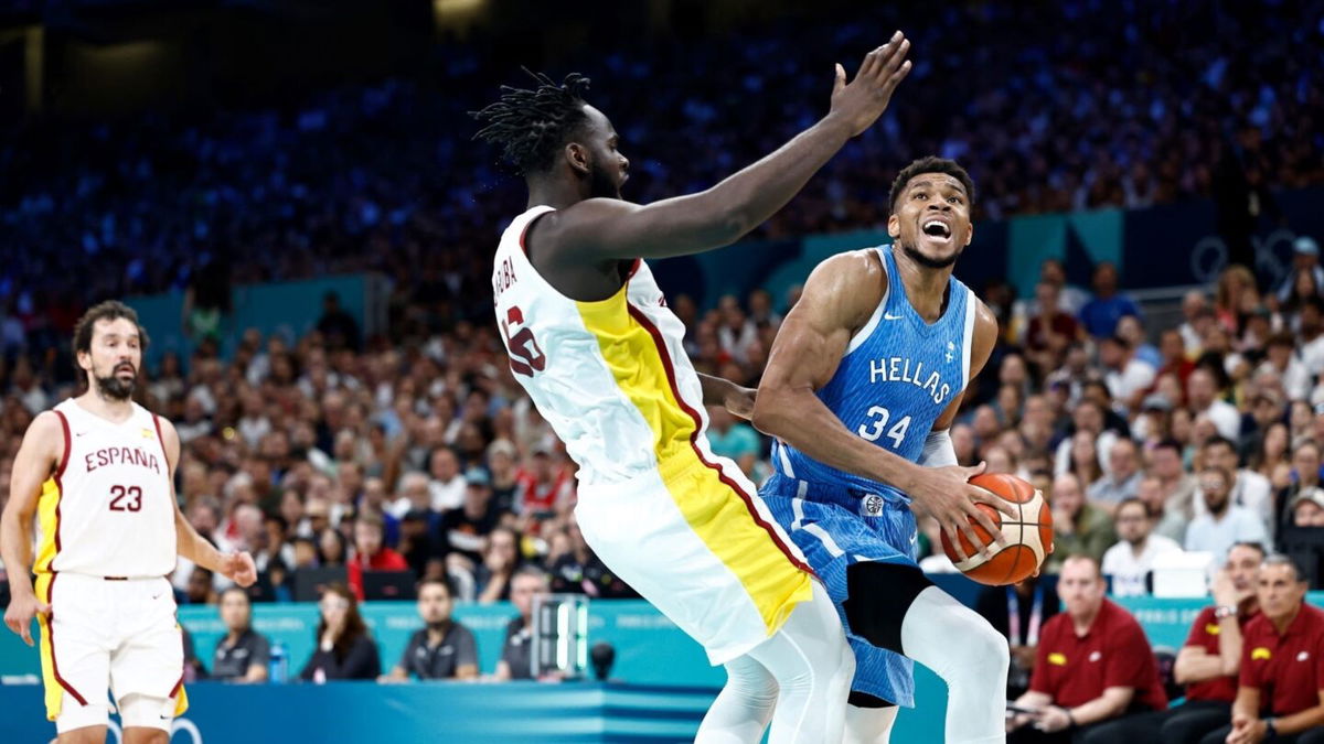 Giannis Antetokounmpo drives against Spain