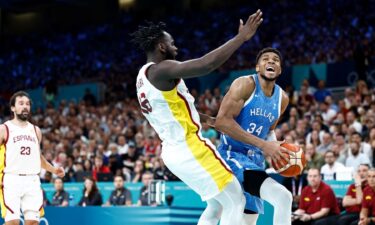 Giannis Antetokounmpo drives against Spain