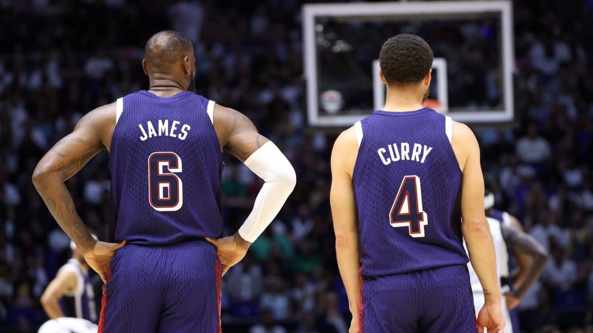 LeBron James and Stephen Curry look on during a U.S. men's basketball game