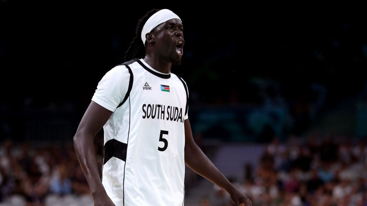 Nuni Omot celebrates during South Sudan's win over Puerto Rico