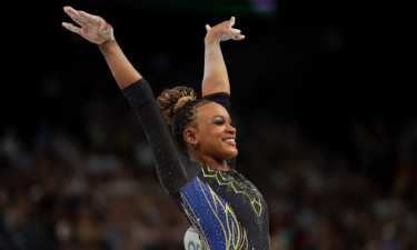 Rebeca Andrade of Brazil celebrates after her vault during women's qualifications at the 2024 Paris Olympic Games.