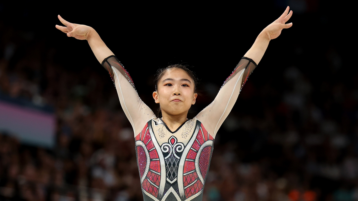 Rina Kishi of Japan reacts after finishing her balance beam routine during women's Qualification at the 2024 Paris Olympic Games.