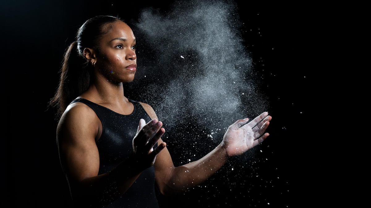 Shilese Jones with chalky hands