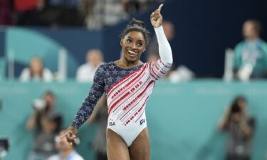 Simone Biles celebrates after her floor routine at the Paris Olympic Games