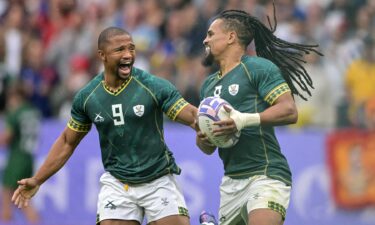 Selyvn Davids and Shaun Williams celebrate