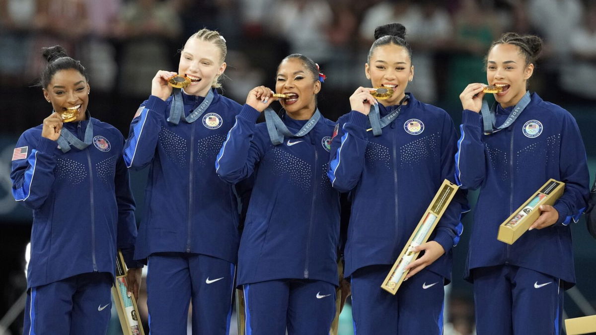 Team USA women's gymnasts celebrate gold medal win