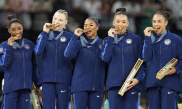 Team USA women's gymnasts celebrate gold medal win