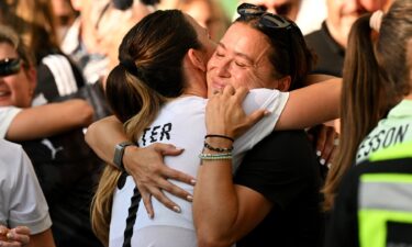 Michaela Foster and Ali Riley hug after New Zealand's match against Canada at the 2024 Paris Olympics.