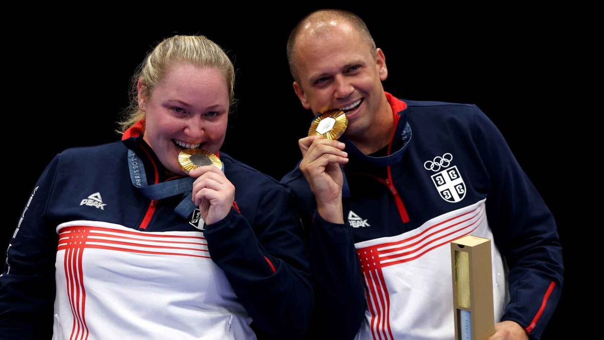 Serbian shooters celebrate after winning gold.