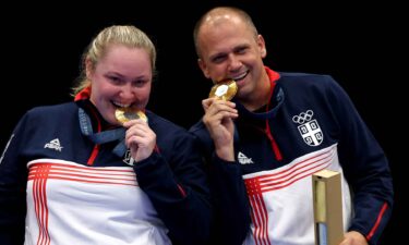 Serbian shooters celebrate after winning gold.