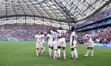 France players celebrate after scoring a goal