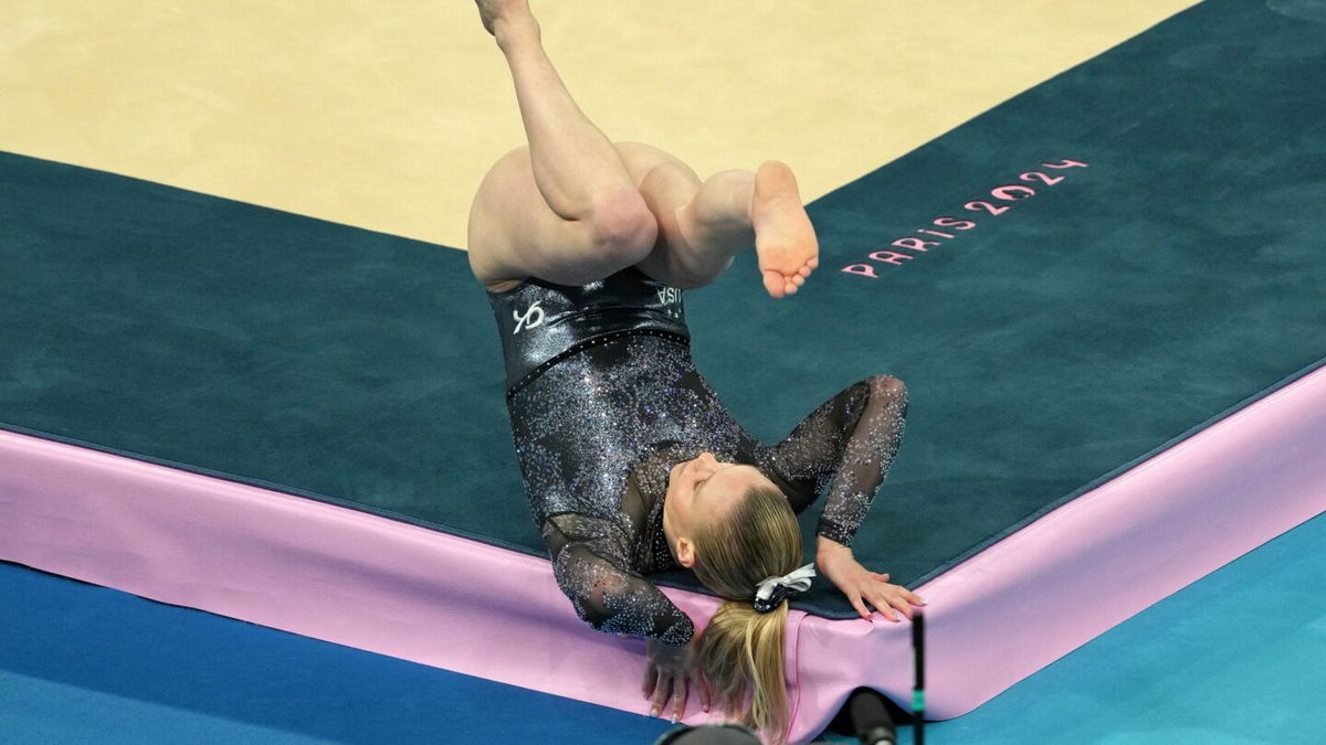 Jade Carey falls during gymnastics qualifications at the 2024 Paris Olympics.