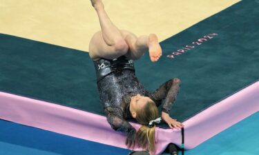 Jade Carey falls during gymnastics qualifications at the 2024 Paris Olympics.