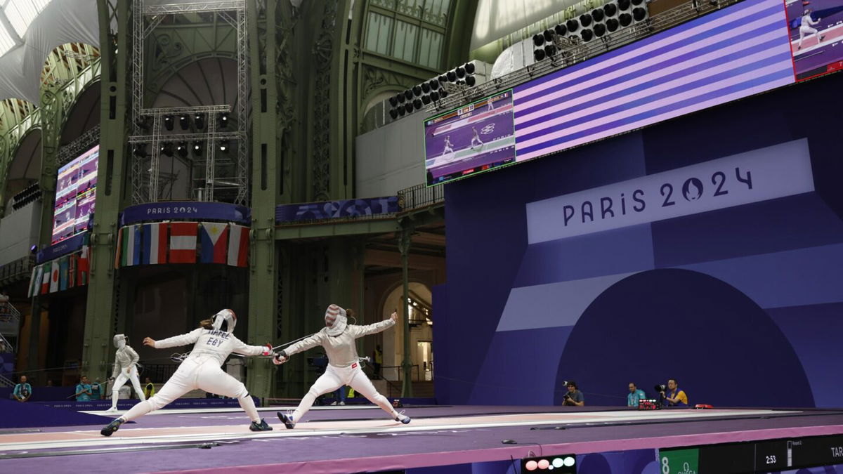 Elizabeth Tartakovsky (USA) competes against Nada Hafez (EGY) in a women's sabre table of 32 bout during the 2024 Paris Olympics.