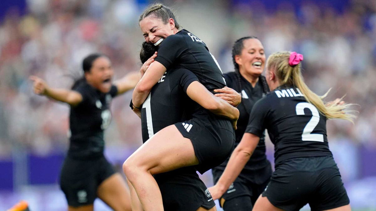 New Zealand celebrates winning gold.