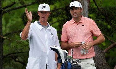 Scottie Scheffler and caddie