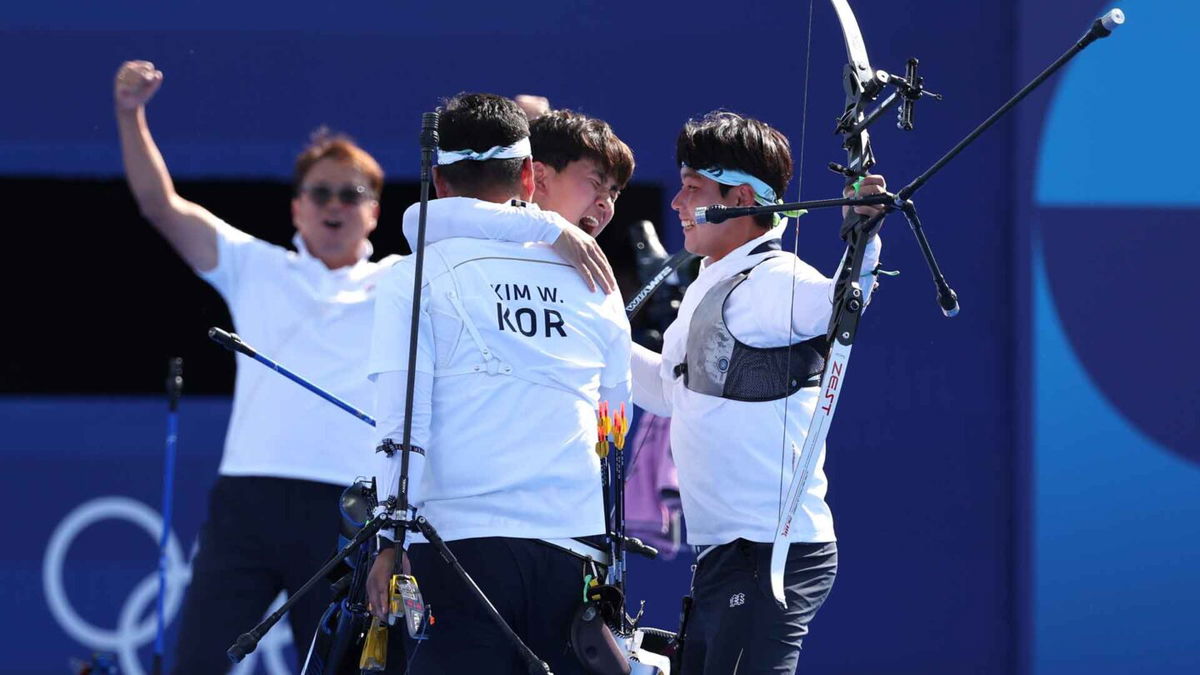 South Korea archer celebrate after winning gold.