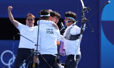 South Korea archer celebrate after winning gold.