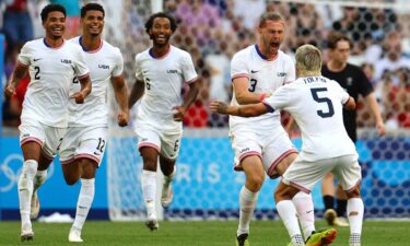 USA players celebrate after scoring a goal