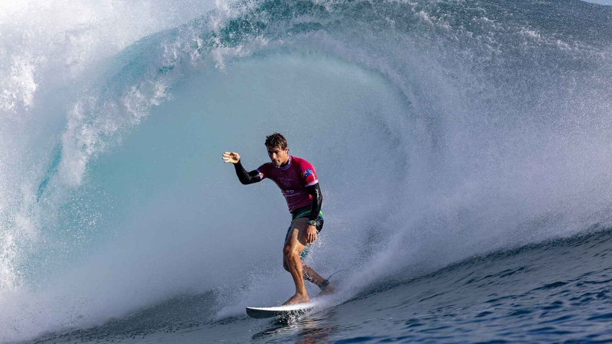 Jack Robinson salutes as he exits wave