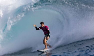 Jack Robinson salutes as he exits wave