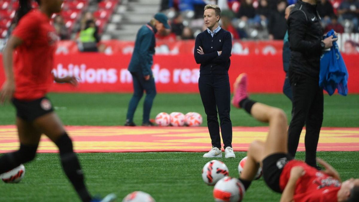 Canada head coach Bev Priestman watches during warm up prior to match against Australia in Dec. 2023.