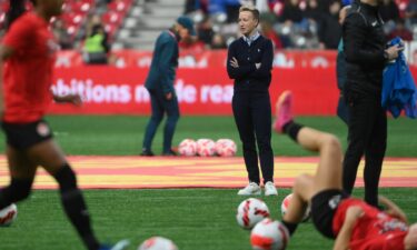 Canada head coach Bev Priestman watches during warm up prior to match against Australia in Dec. 2023.