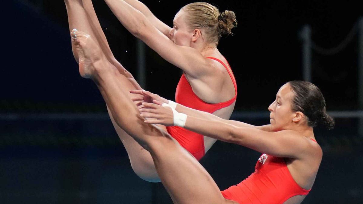 Jessica Parratto and Delaney Schnell (USA) in the women's 10m platform synchronized diving competition during the Tokyo 2020 Olympic Summer Games at Tokyo Aquatics Centre.