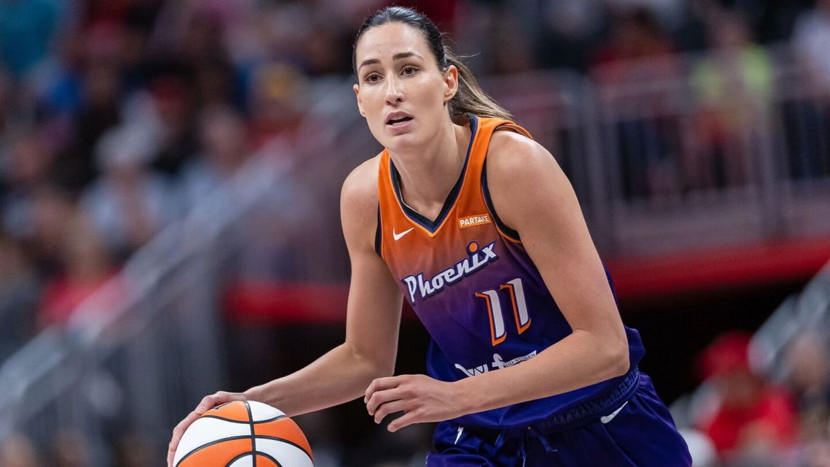 Phoenix Mercury player Rebecca Allen dribbles during a game