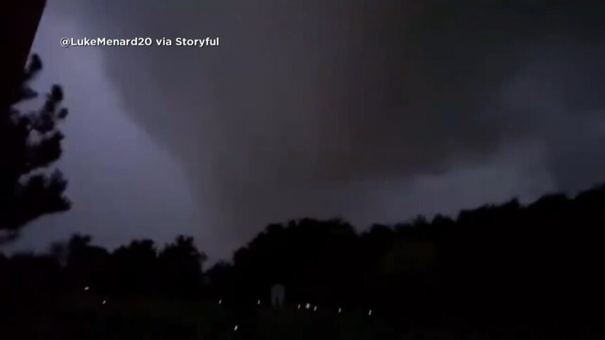 CAUGHT ON CAMERA: Lightning flashes through a funnel cloud - KYMA