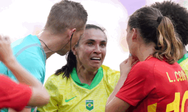 A distressed Marta is in tears after being shown a red card for Brazil vs Spain