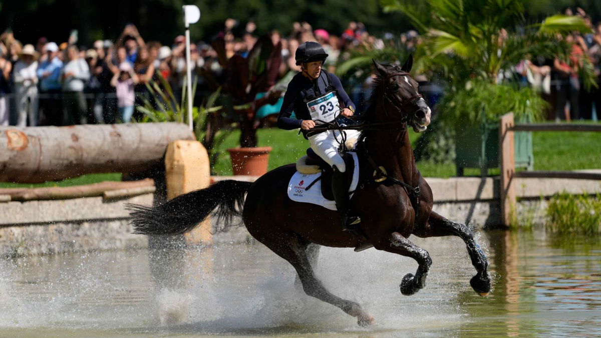 Peter Flarup (DEN) competes in the eventing individual equestrian competition during the Paris 2024 Olympic Summer Games at Chateau de Versailles.