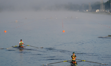 Rowers warm up before rowing competition during the Paris Olympic Games at Vaires-sur-Marne Nautical Stadium.