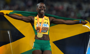 Shericka Jackson poses for a photograph after winning the women's 200m race at the 2023 World Athletics Championships.