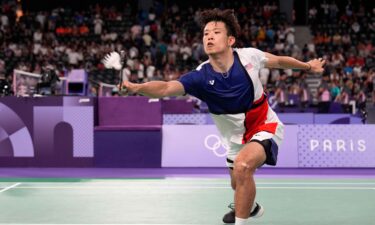 Vinson Chiu (USA) hits the shuttlecock in a point during the Paris 2024 Olympic Summer Games at Adidas Arena.