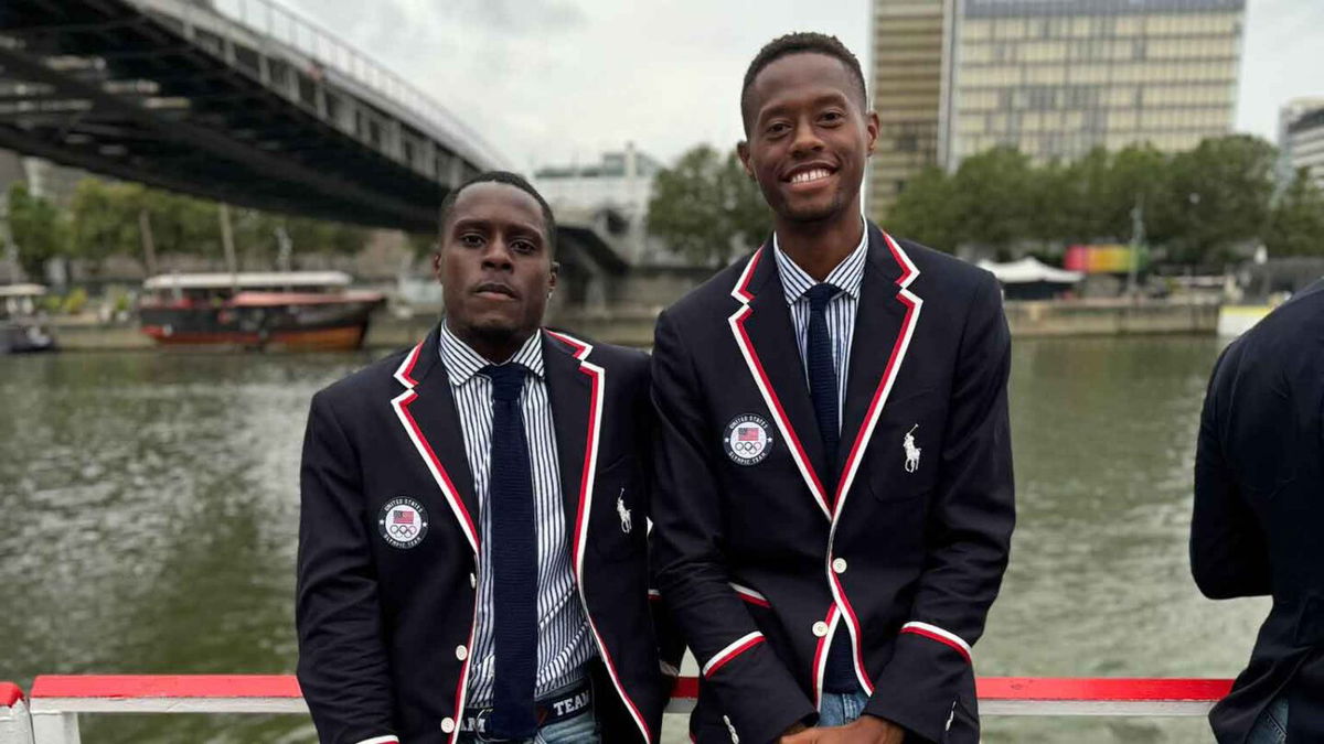 Olympians and former high school classmates Christian Coleman (track and field) and Chris Eubanks (tennis) pose together on the Team USA boat during the Opening Ceremony in Paris.