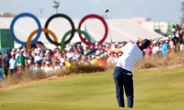 Justin Rose chips onto the green at the Rio Games.