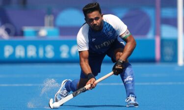 Harmanpreet Singh of Team India passes the ball during the Men's Pool B match between Ireland and India on day four of the Olympic Games Paris 2024 at Stade Yves Du Manoir on July 30