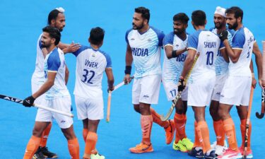 Mandeep Singh of Team India (2R) celebrates scoring his team's first goal with teammates during the Men's Pool B match between India and New Zealand on day one of the Olympic Games Paris 2024 at Stade Yves Du Manoir on July 27