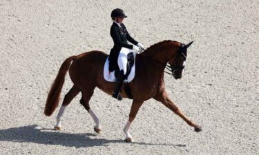 Nanna Skodborg Merrald and horse Zepter of Team Denmark compete in the Dressage Grand Prix Team and Individual Qualifier on day four of the Olympic Games Paris 2024 at Chateau de Versailles on July 30