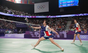 Annie Xu and Kerry Xu (USA) compete in a women's doubles badminton match during the Paris 2024 Olympic Summer Games at Adidas Arena.