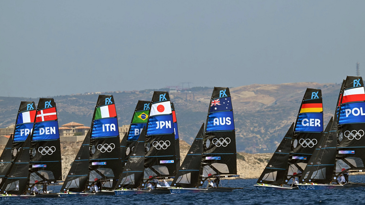 Competitors arrive to take the start of Race 1 of the women's 49erFX skiff event during the Paris Olympic Games.