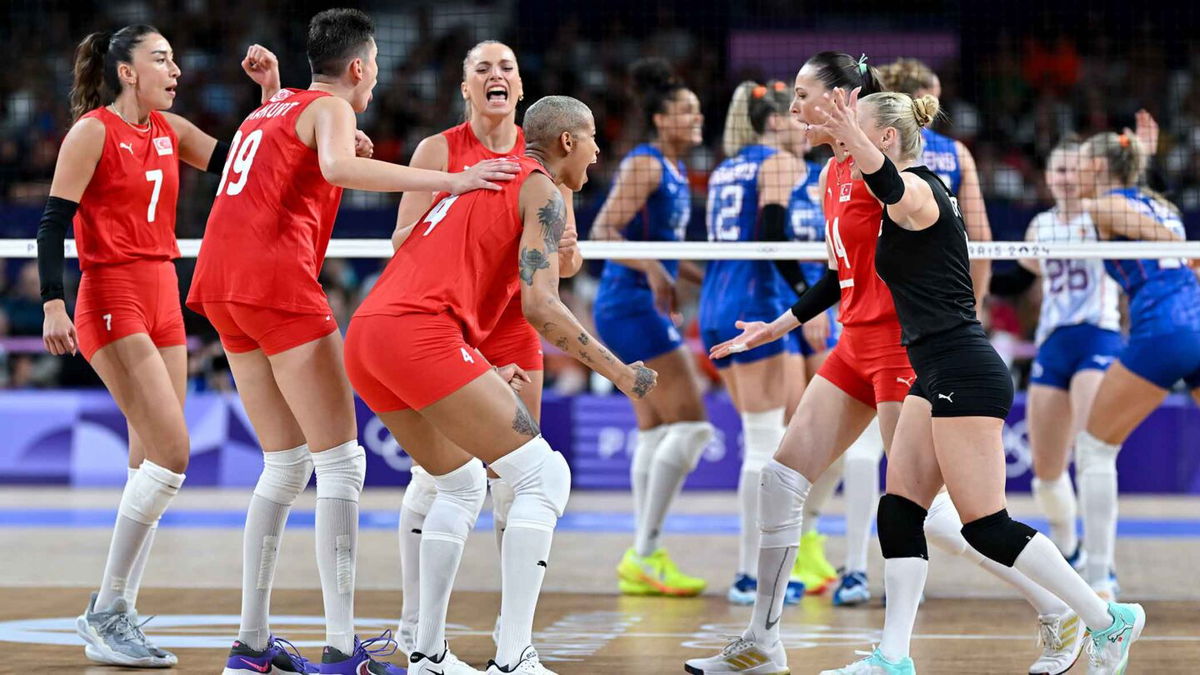 Players of Turkiye celebrate after a score during the women's preliminary round volleyball match between Turkiye and the Netherlands during the Paris 2024 Olympic Games at the South Paris Arena 1 in Paris on July 29