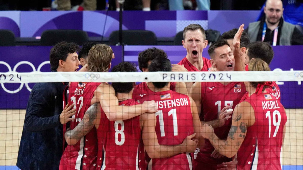 United States of America men's volleyball players celebrate after defeating Argentina during the Paris 2024 Olympic Summer Games at South Paris Arena 1.