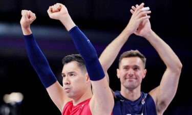 United States libero Erik Shoji (22) and outside hitter Thomas Jaeschke (17) celebrate after their win against Germany during the Paris 2024 Olympic Summer Games at South Paris Arena 1.