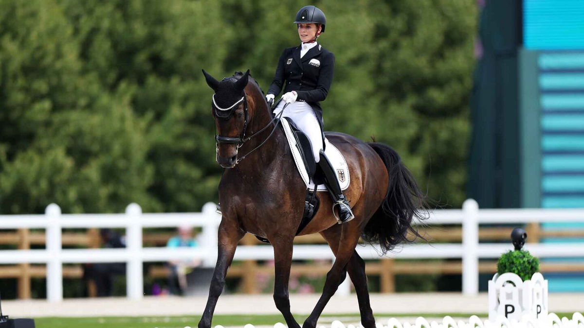 Jessica von Bredow-Werndl and horse TSF Dalera BB of Team Germany compete in the Dressage Grand Prix Team and Individual Qualifier on day five of the Olympic Games Paris 2024 at Chateau de Versailles on July 31