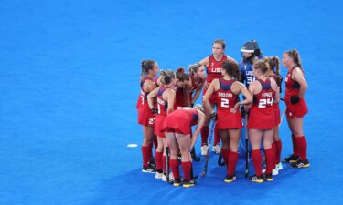 Team United States huddle on pitch during the Women's Pool B match between Argentina and United States on day one of the Olympic Games Paris 2024 at Stade Yves Du Manoir on July 27