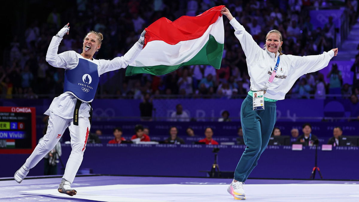 Viviana Marton celebrates with flag at 2024 Paris Olympic Games